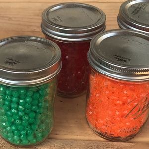 Plastic beads in variety of colors/shapes